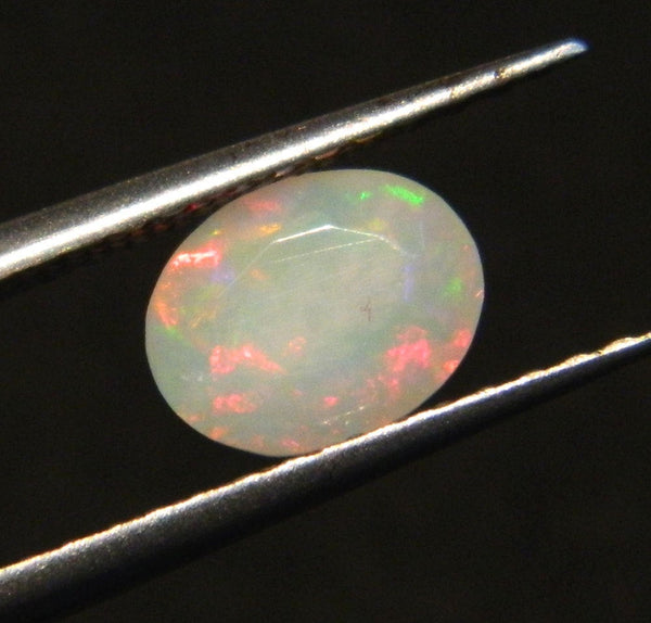 0.90 Carats, Faceted Ethiopian Opal Gemstone, Welo Opal,  Oval Shape, Cut Opal Oval Shape Gemstone, 6.5 x 8mm
